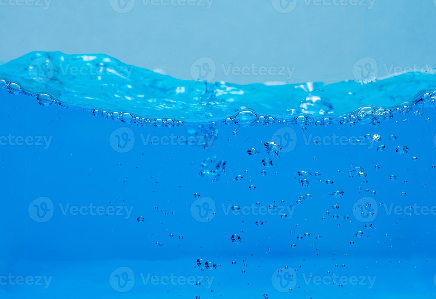 Water and air bubbles over white background with space for text photo
