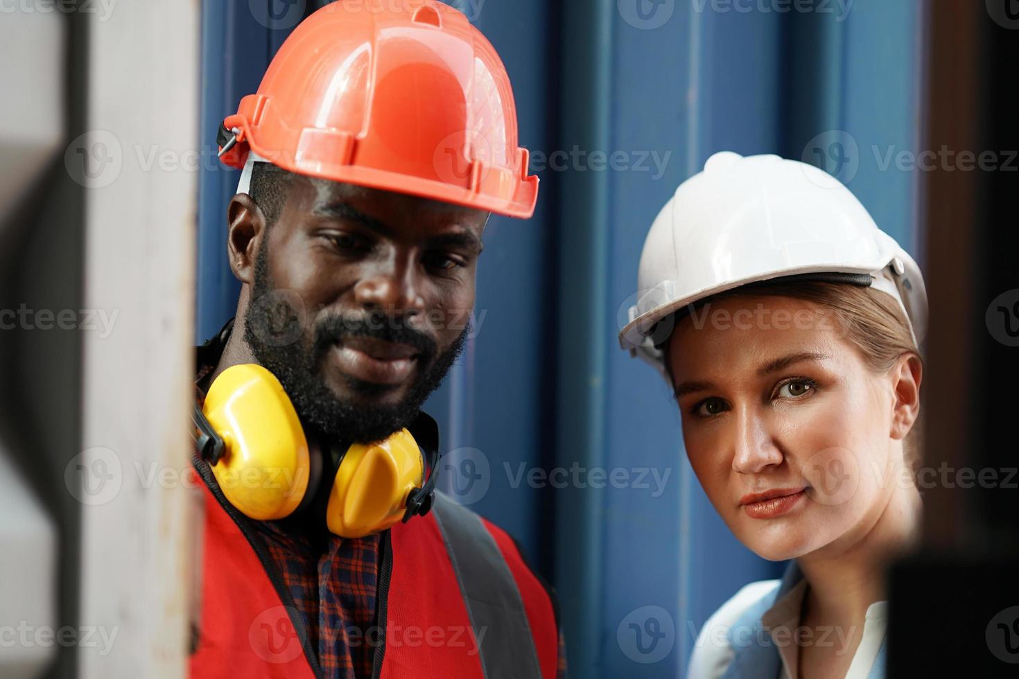 foreman checking containers in the terminal, at import and export business logistic company. photo