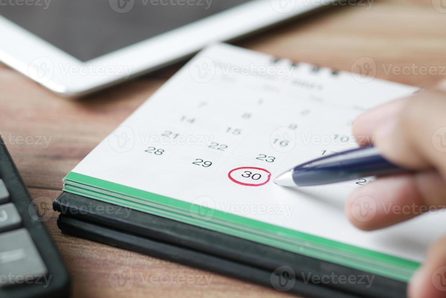 deadline concept with red mark on calendar date photo