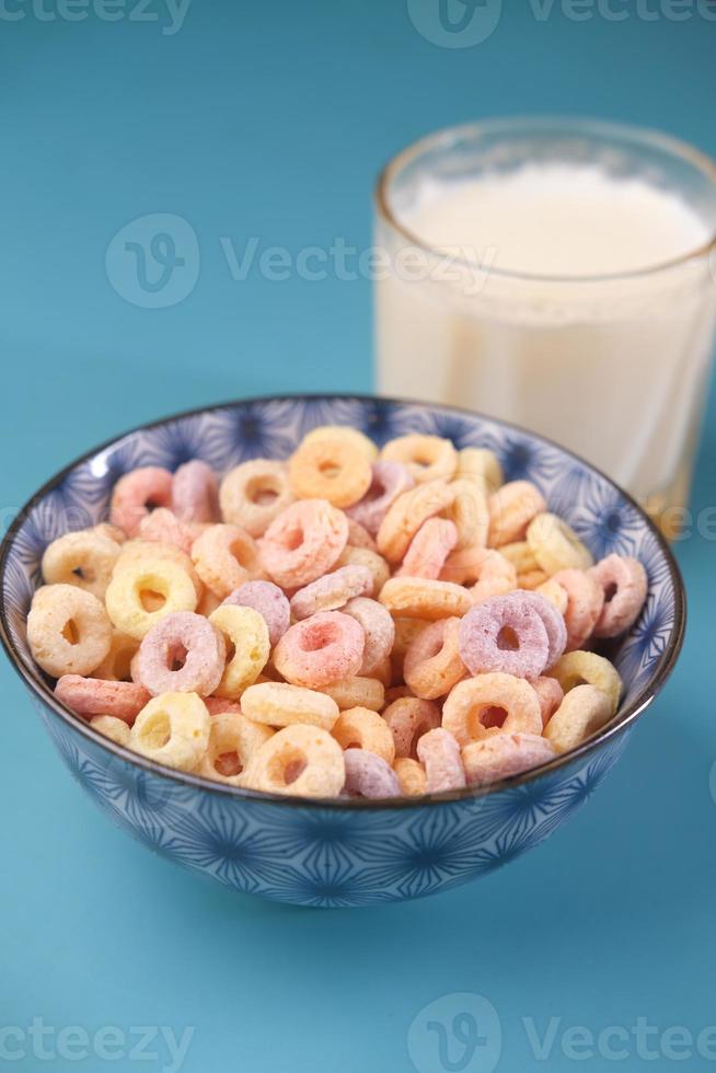 close up of colorful cereal corn flakes in a bowl photo