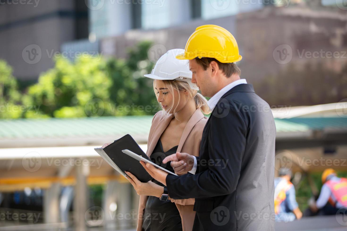 Group of construction engineer working in construction site and management in the construction site photo