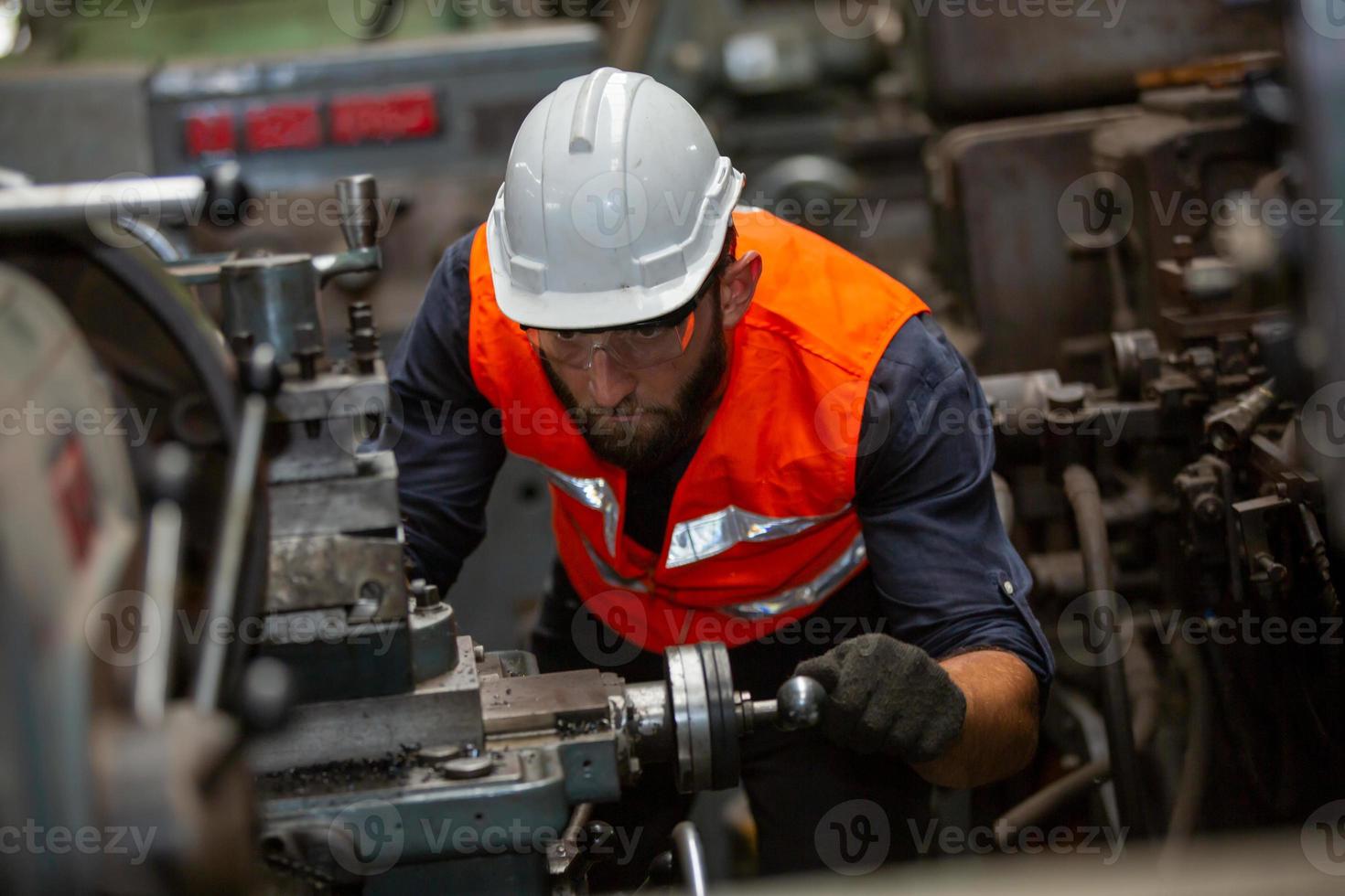 Foreman or worker work at factory site check up machine or products in site. Engineer or Technician checking Material or Machine on Plant. Industrial and Factory. photo