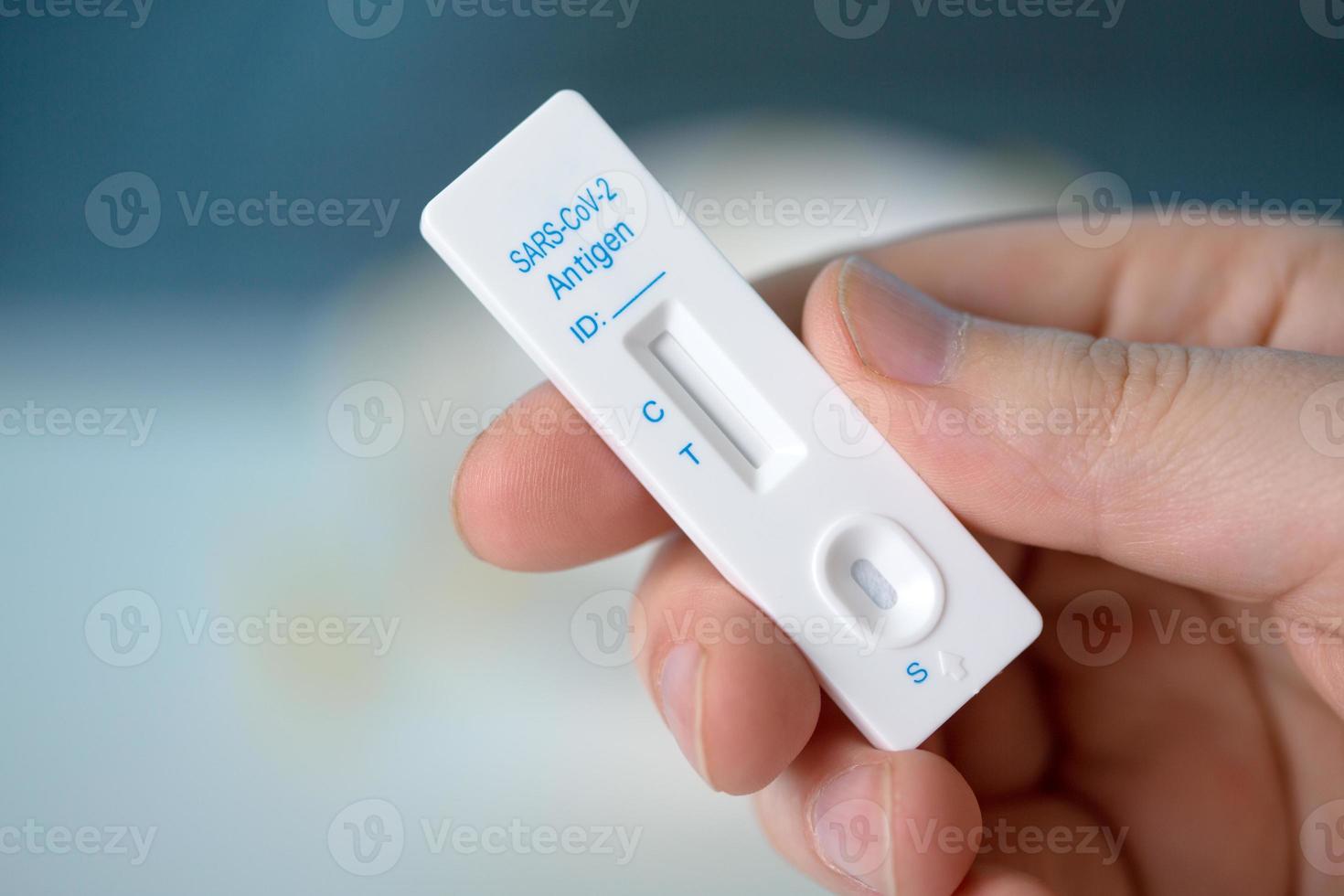 Corona virus antigen fast test. Lab card kit test for COVID-19. photo