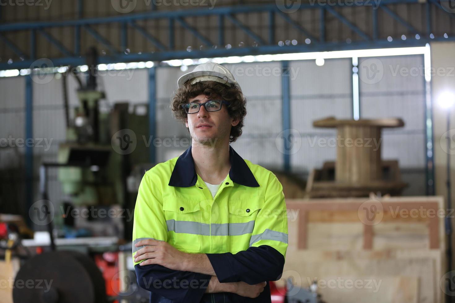 engineer checking control panel and teaching new Automatics robot arm and operating control machine in factory. photo