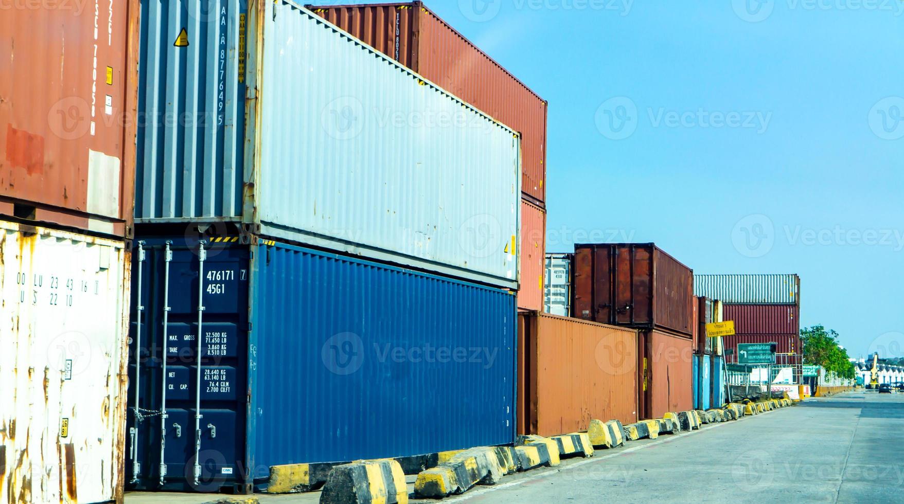 Container loading in a Cargo freight ship with industrial crane. Container ship in import and export business logistic company. Industry and Transportation concept. photo