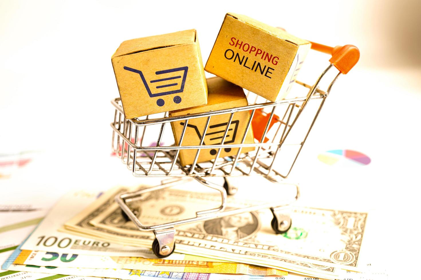 Online shopping, Shopping cart box with money, import export, finance commerce. photo