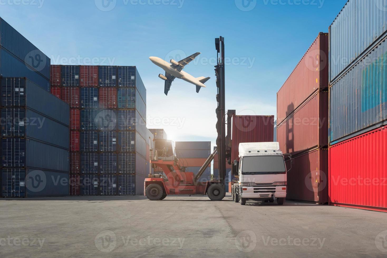 Industrial container yard with forklift working photo