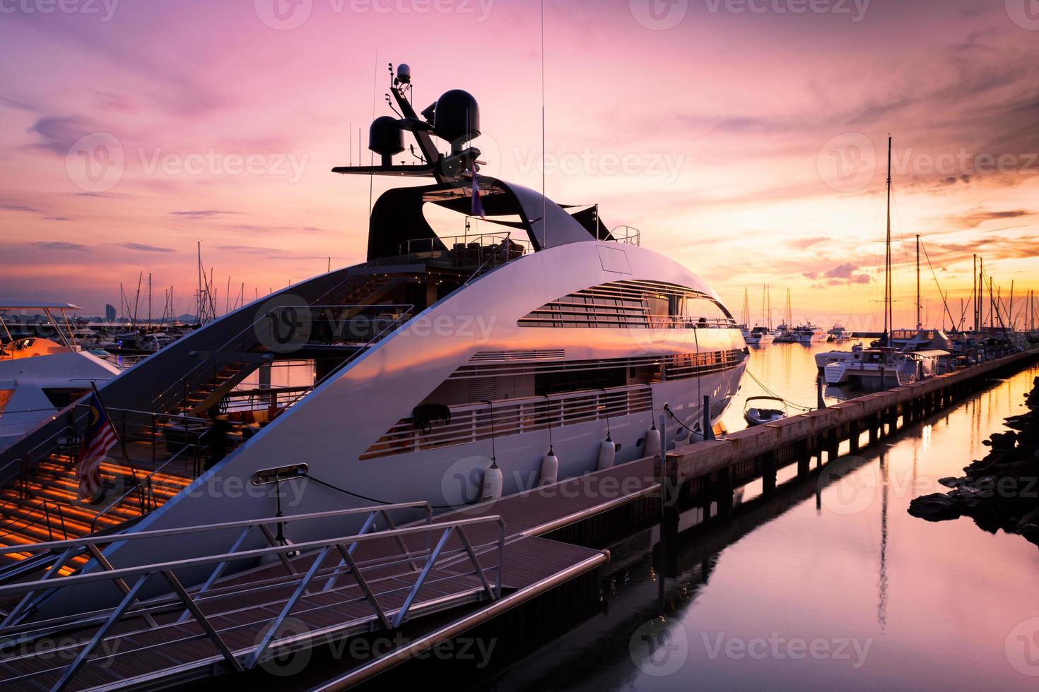 View of Harbor and marina with moored yachts and motorboats in Pattaya Thailand photo