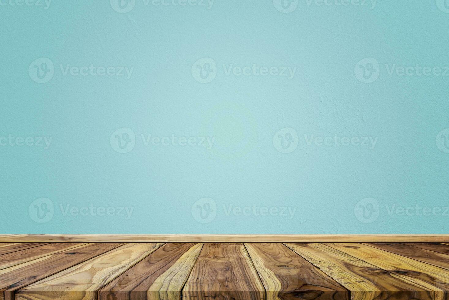 Empty interior room with light blue cement wall texture and brown wooden floor pattern. Concept interior vintage style photo