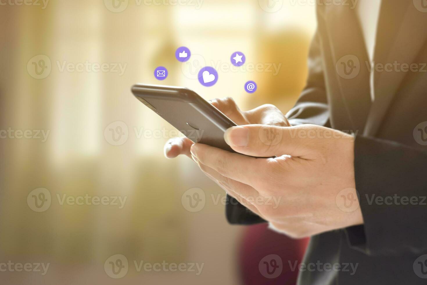 Businessman hands using mobile smartphone with icon social media and network connection. Concept of business or online marketing. photo