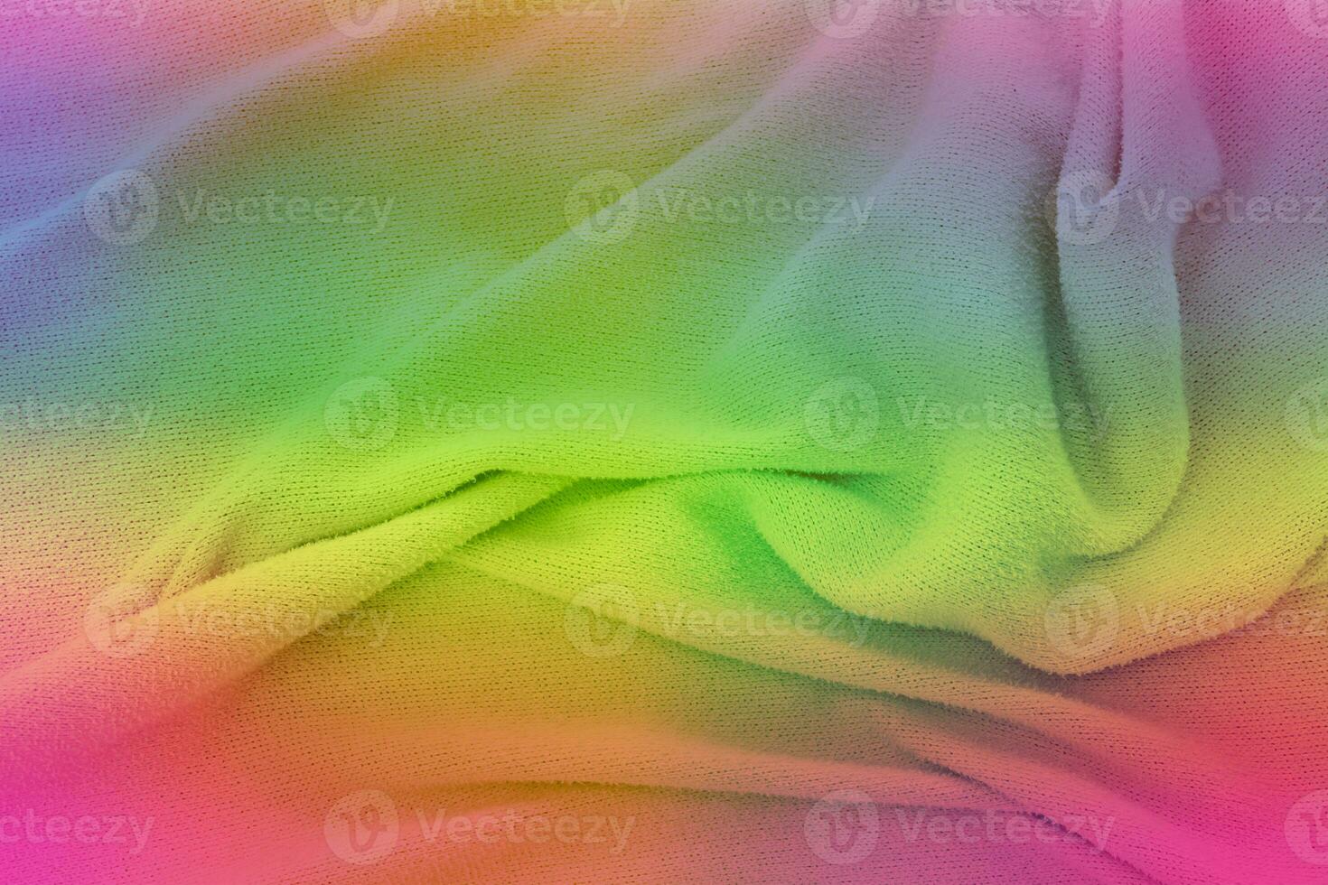 Soft fabric in rainbow colored. multicolor cloth texture background photo