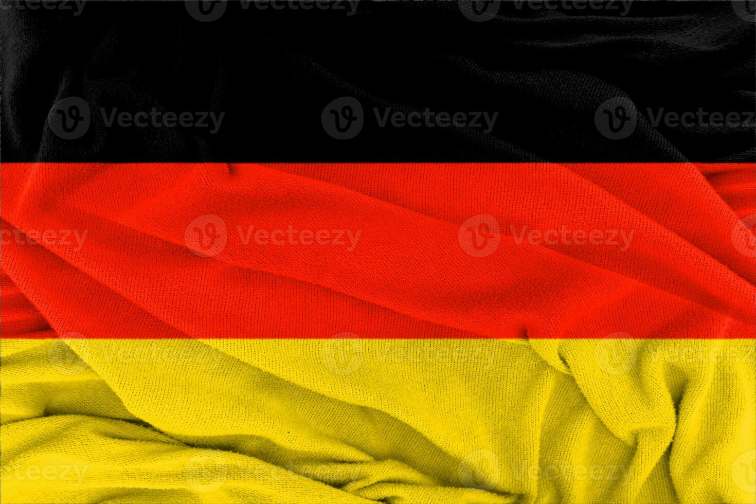bandera nacional de textura ondulada de tela de alemania. foto