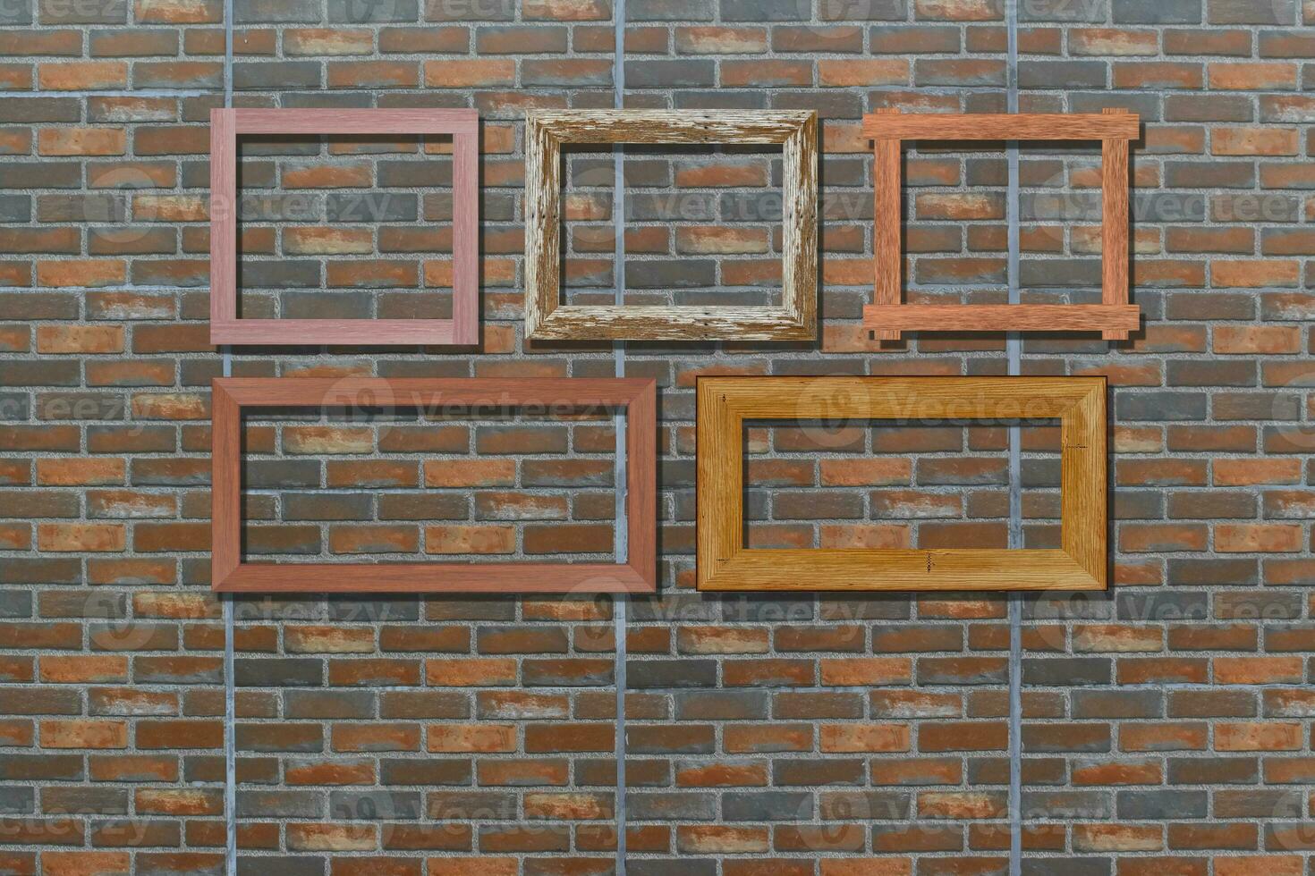 Vintage photo frames on brick wall for interior or background.