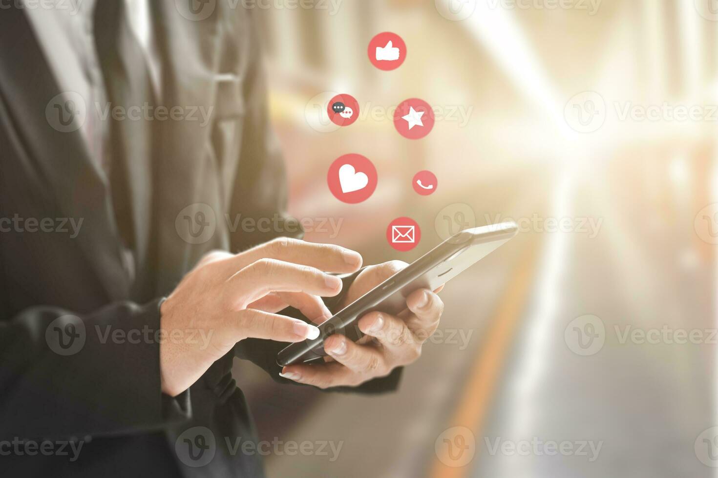 Businessman hands using mobile smartphone with icon social media and network connection. Concept of business or online marketing. photo