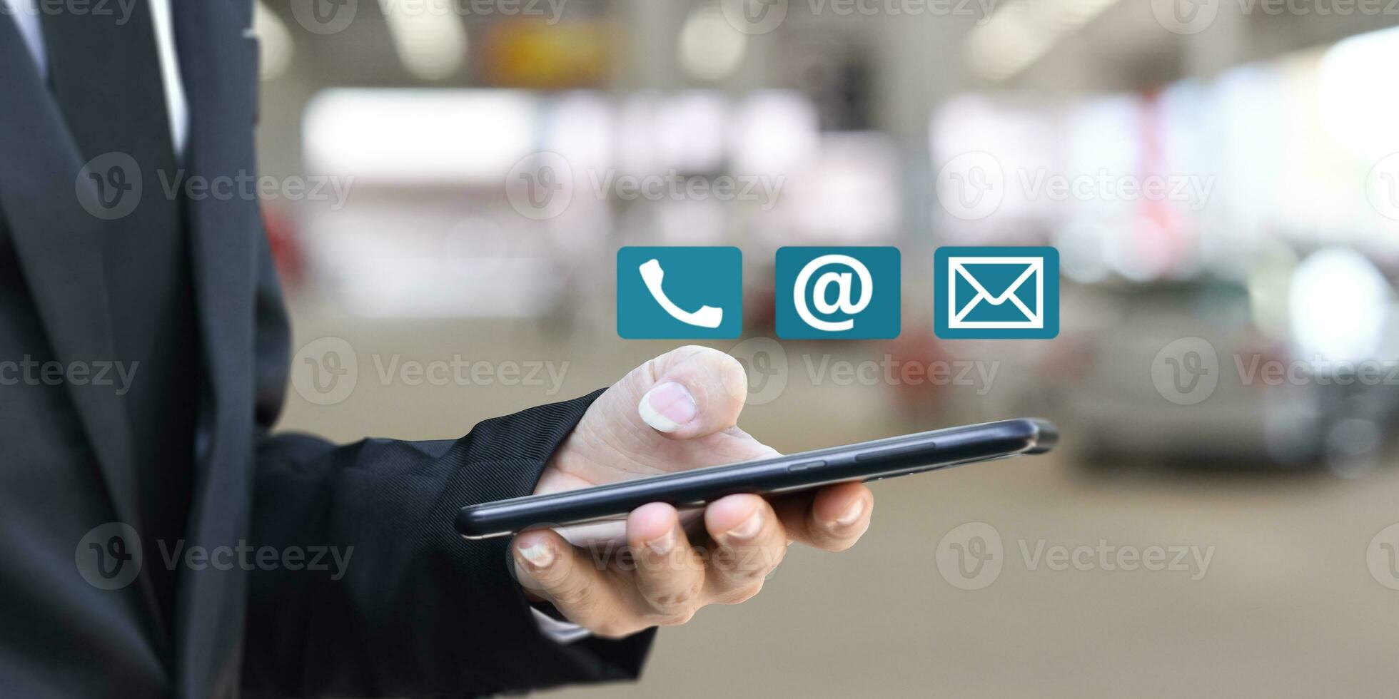 Businessman using mobile smartphone. Concept of Contact Us, customer support. photo