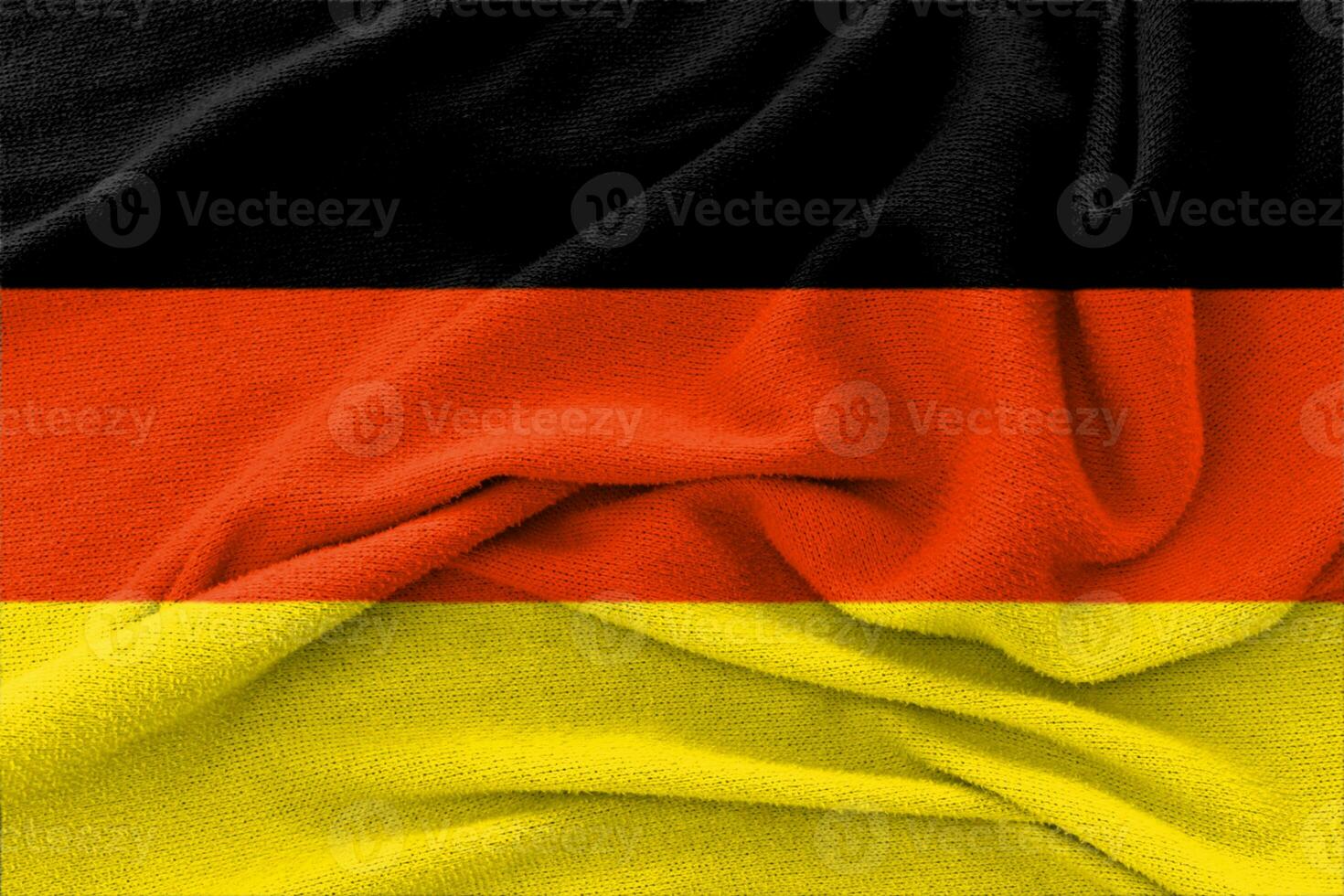 Fabric wavy texture national flag of Germany. photo