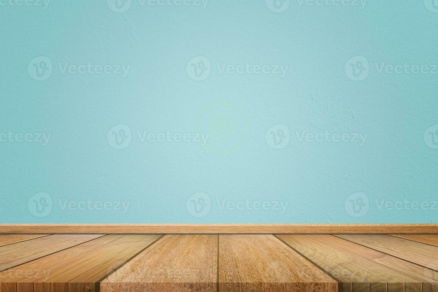 Empty interior room with light blue cement wall texture and brown wooden floor pattern. Concept interior vintage style photo