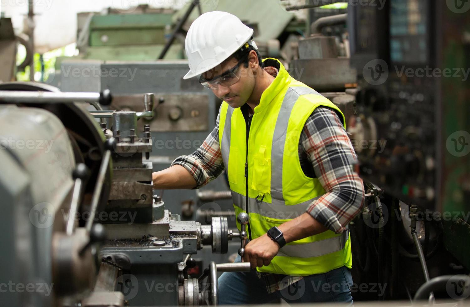 Worker work at factory site check up machine in products line or products in site. Engineer or Technician checking Material or Machine on Plant. Industrial and Factory. photo