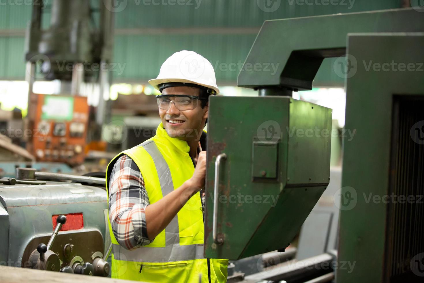 Worker work at factory site check up machine in products line or products in site. Engineer or Technician checking Material or Machine on Plant. Industrial and Factory. photo