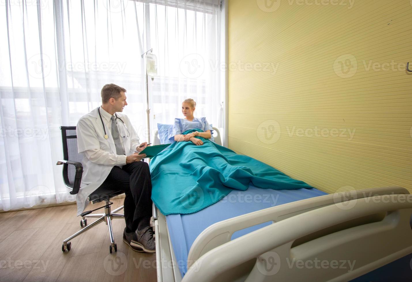 Doctor and patient in hospital photo