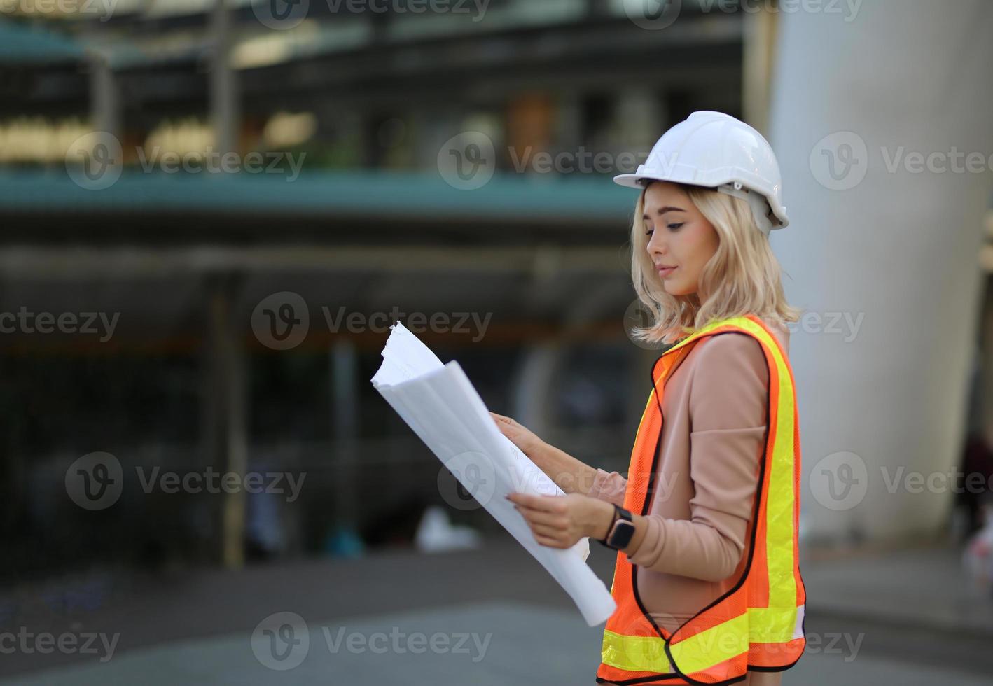 Architect of construction engineer working in construction site and management in the construction site photo