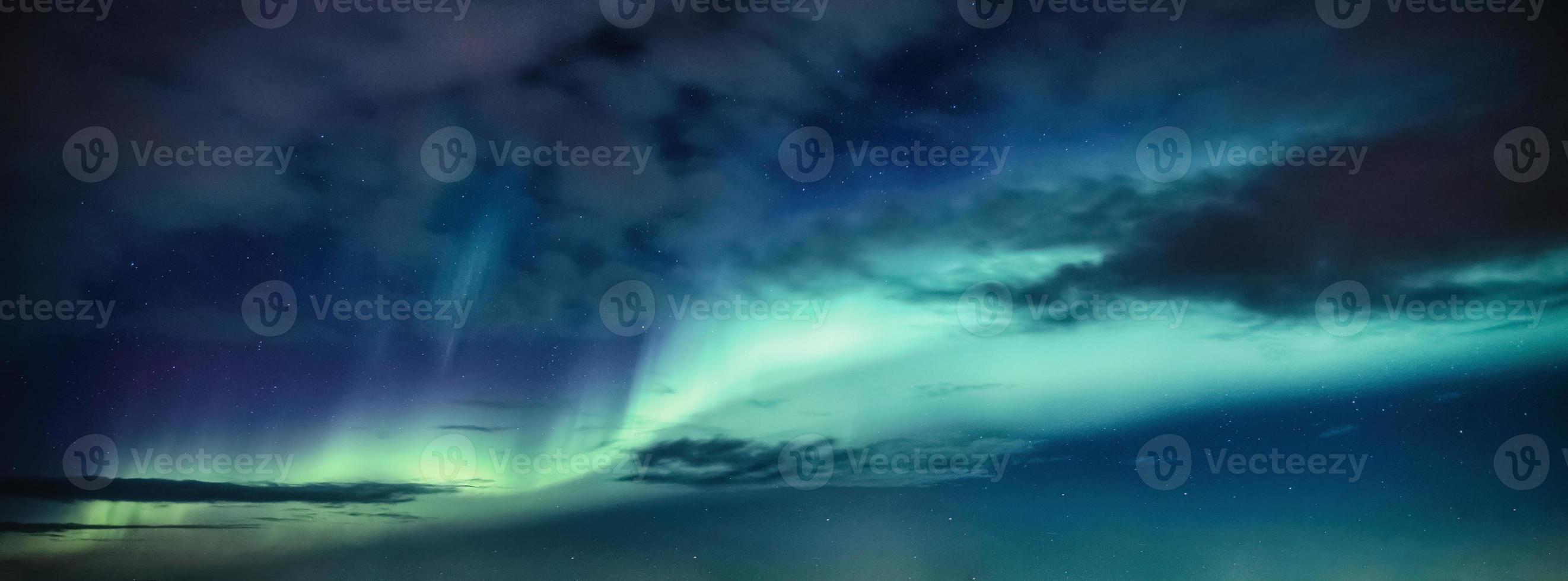 Beautiful aurora borealis with starry in the night sky photo