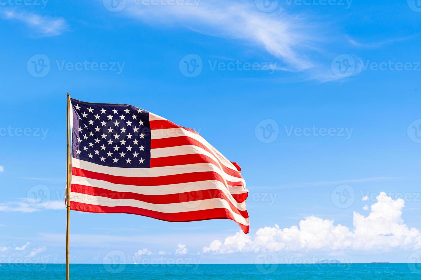 Flag of United States of America USA waving in the wind photo