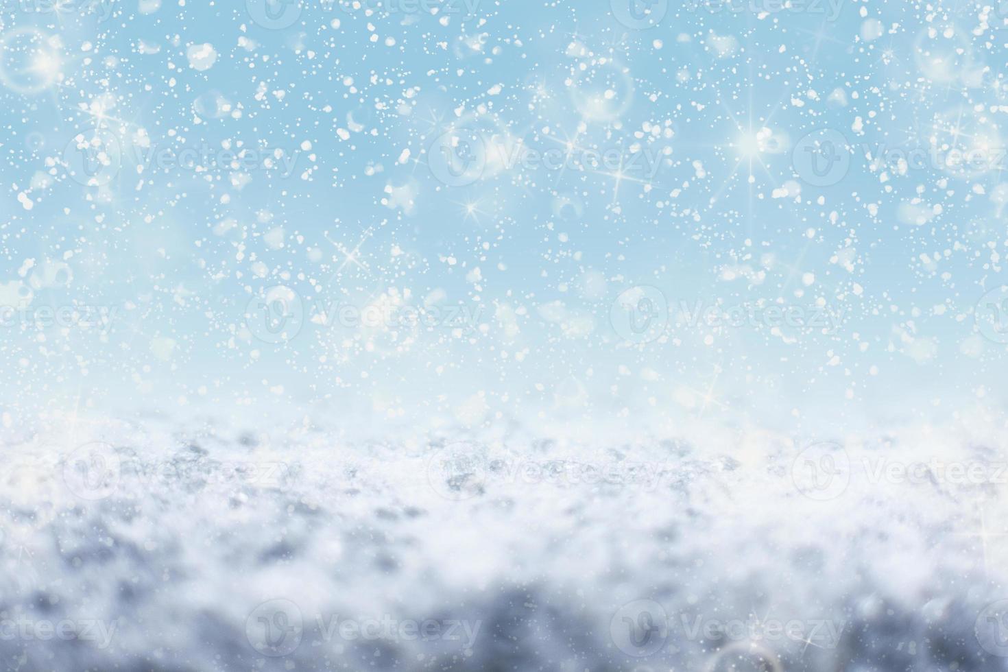 Snowing glitter on snowflake background photo