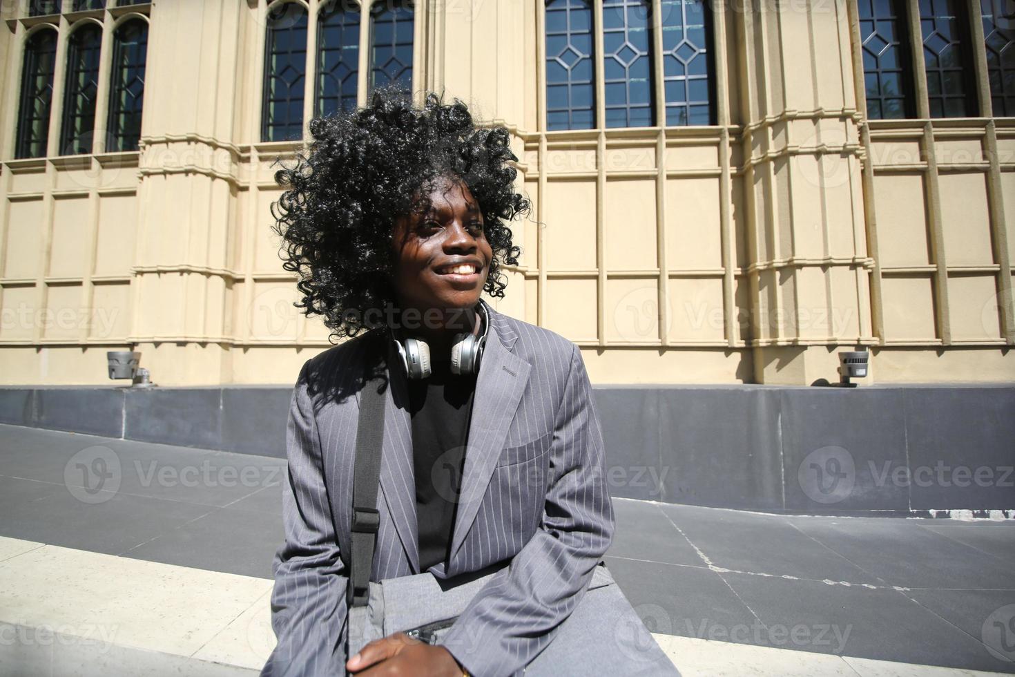 Portrait of young African American hipster man posing at outdoor. photo