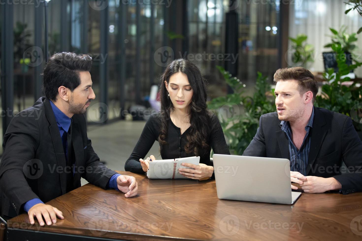 Group of business people collaborating in office or Multiethnic business people in meeting. photo