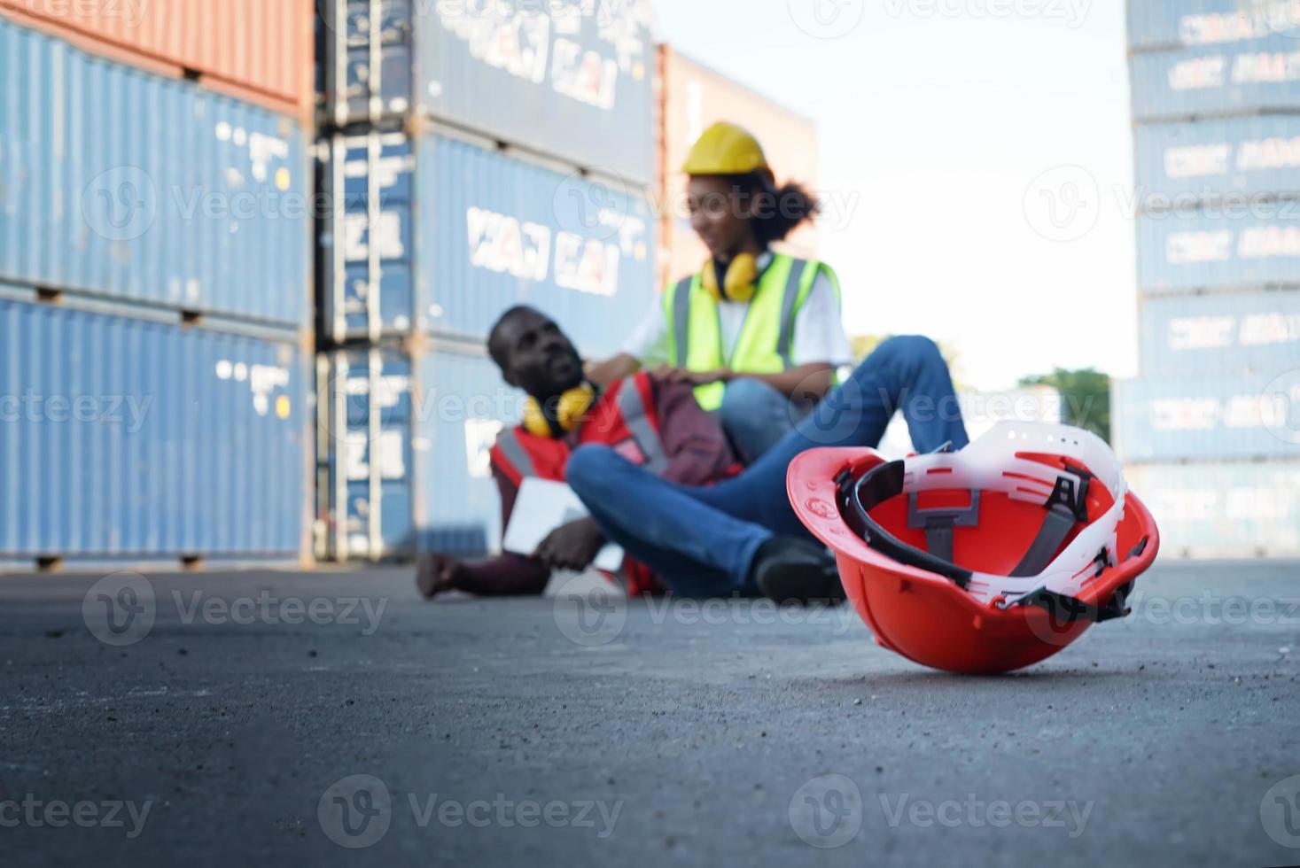 Foreman control loading Containers box from Cargo freight ship for import export. photo