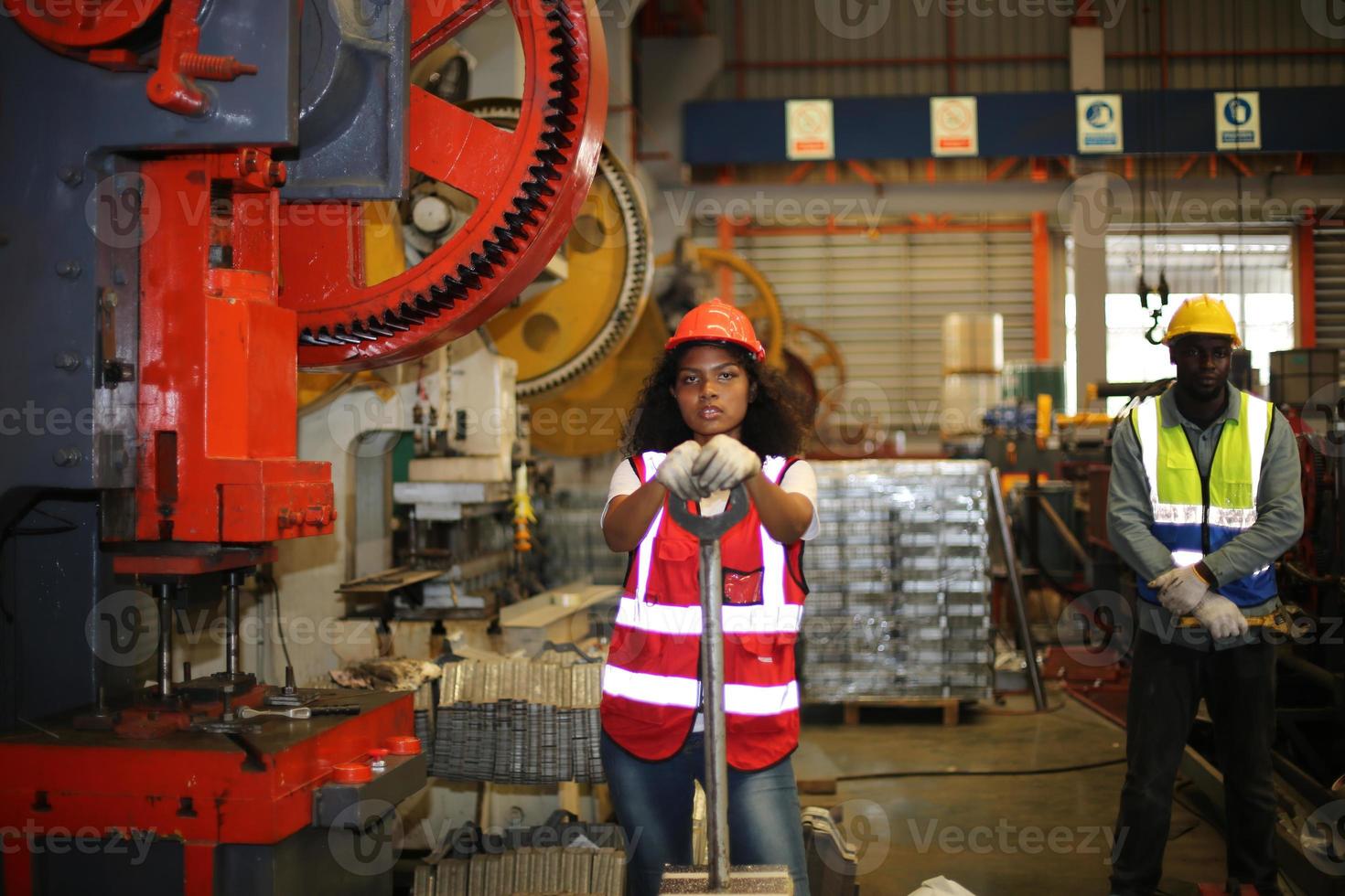 Industry worker Foreman or worker work at factory site check up machine or products in site. Engineer or Technician checking Material or Machine on Plant. Industrial and Factory. photo