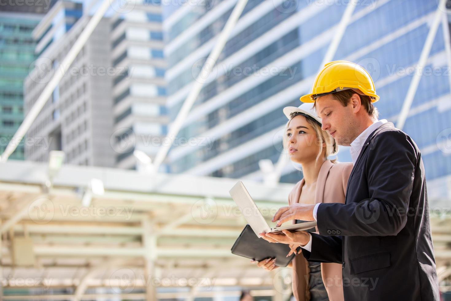 Group of construction engineer working in construction site and management in the construction site photo