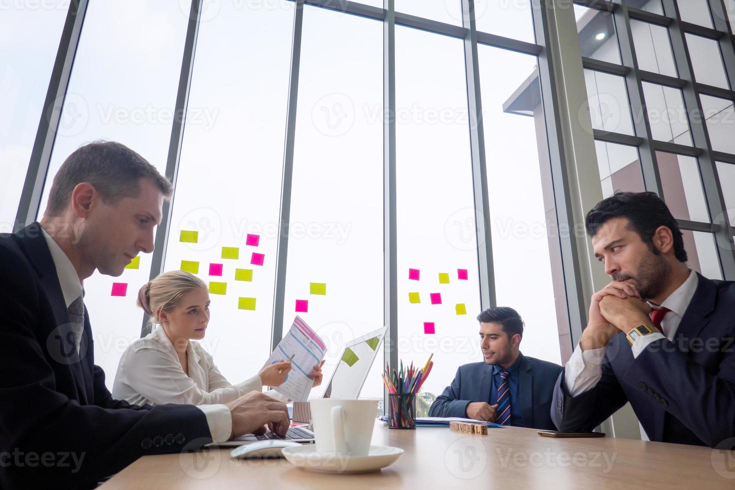 Group of business people collaborating in office or Multiethnic business people in meeting. photo