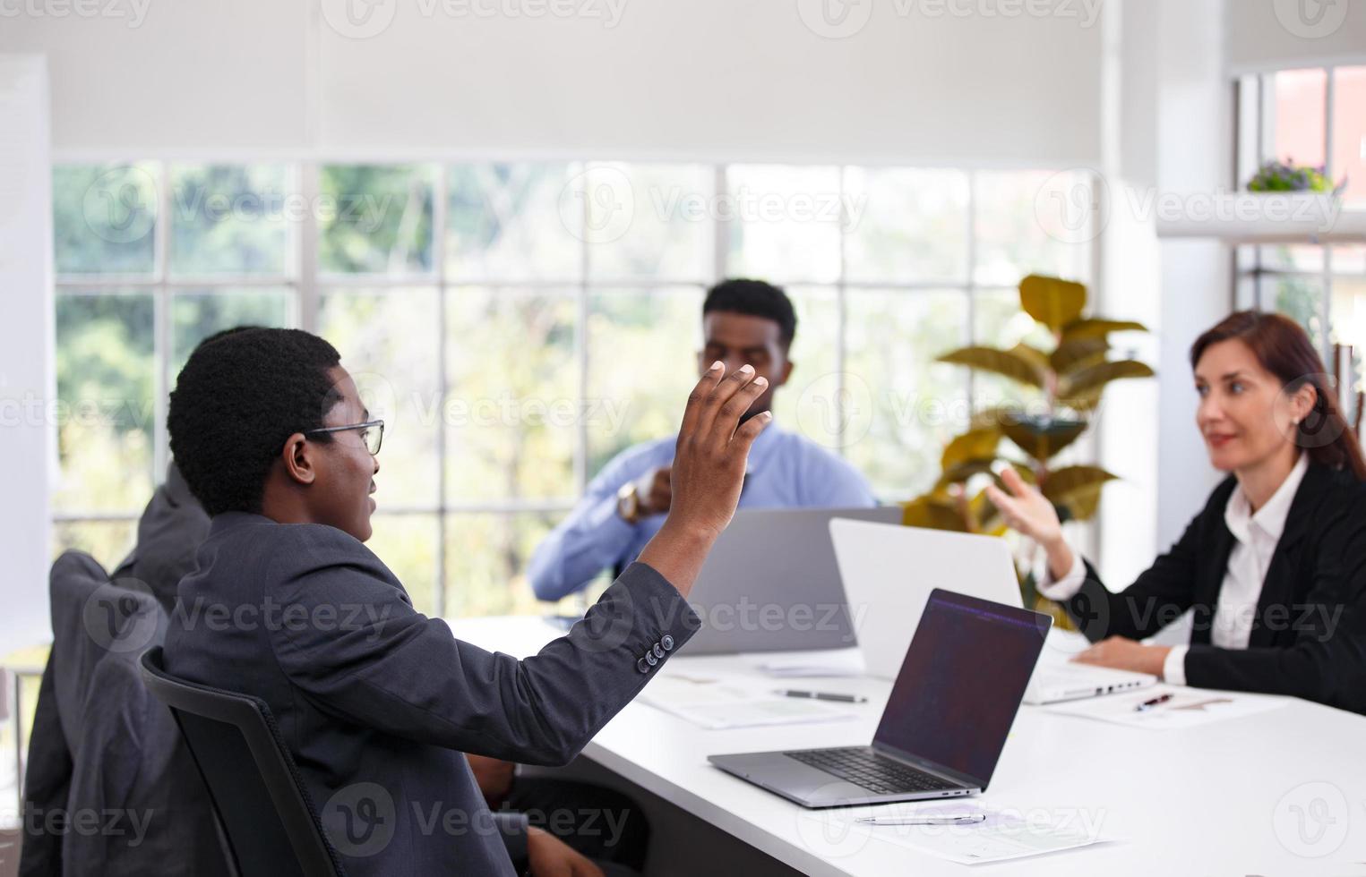 Young start-up business team working in meeting room. photo