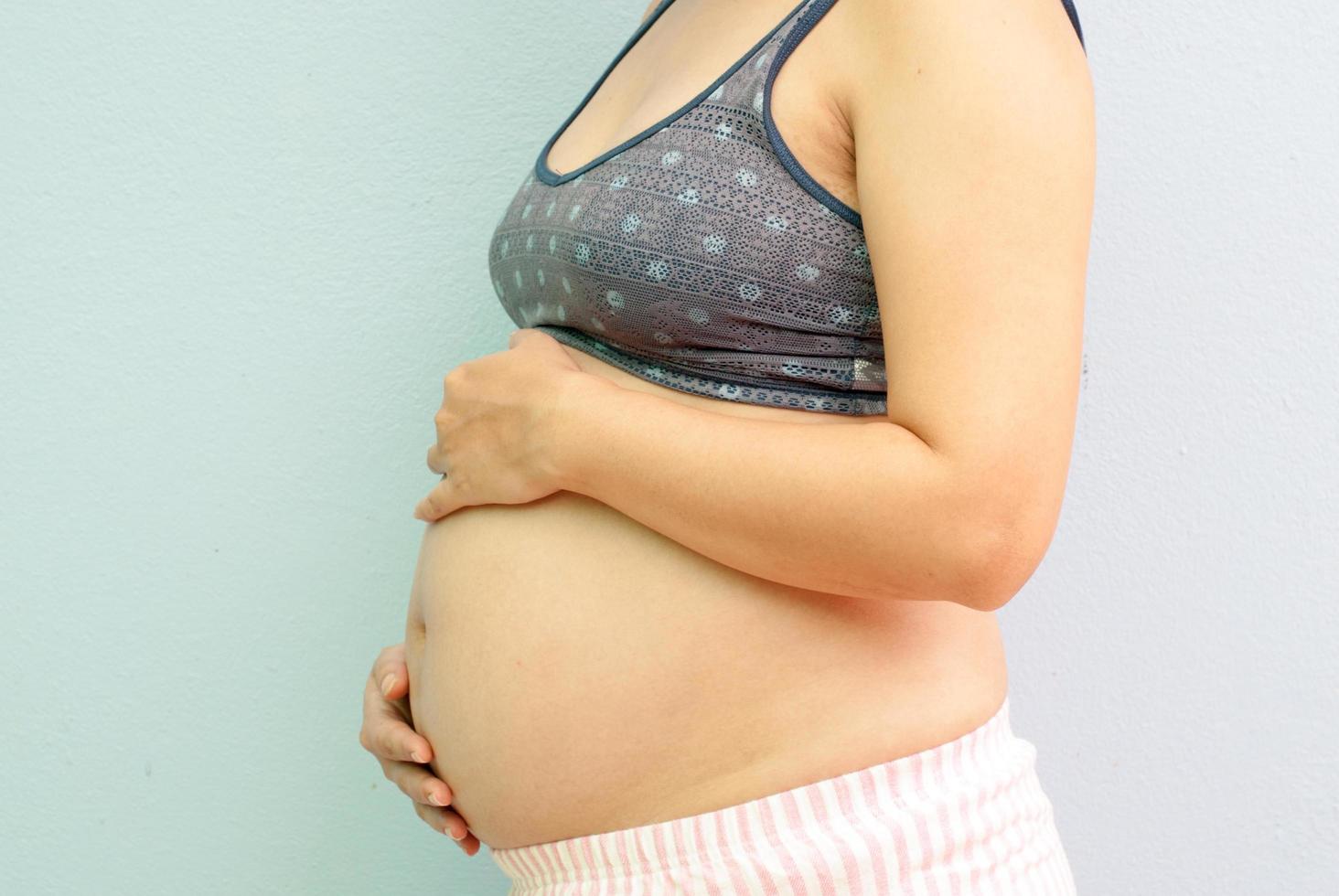 Closeup of pregnant woman photo