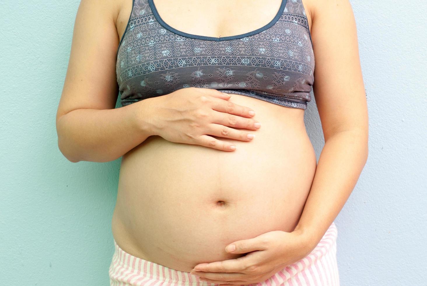 Closeup of pregnant woman photo