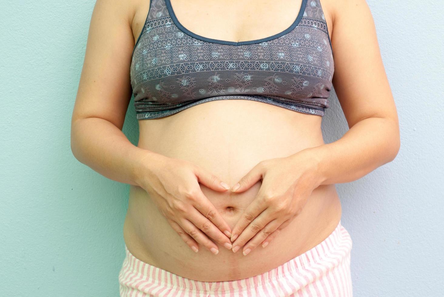 Closeup of pregnant woman photo