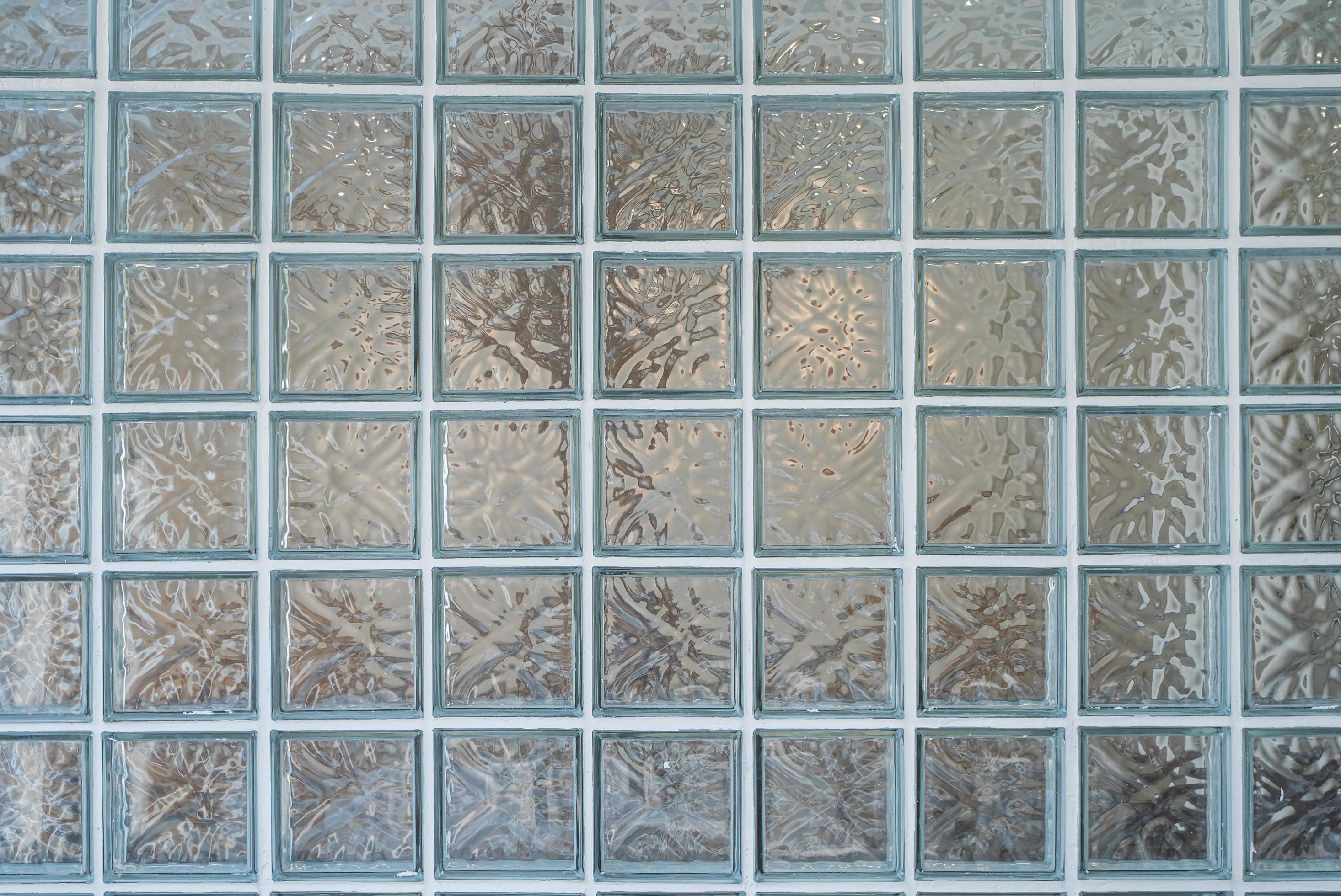 Glass block wall closeup for background, Transparent brick glass wall