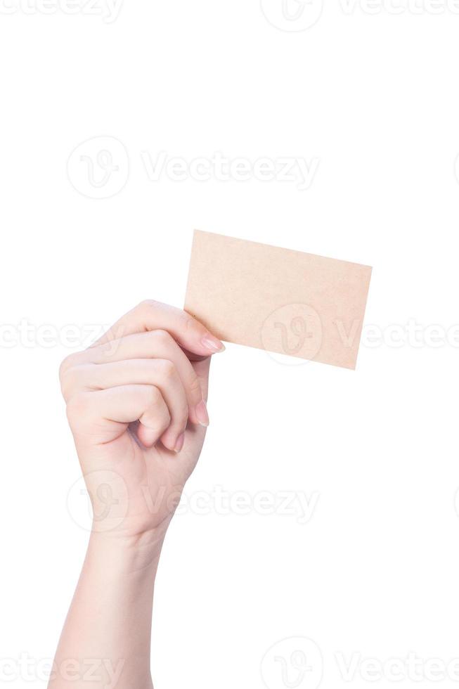 Young asia clean girl hand holding a blank kraft brown paper card template isolated on white background, clipping path, close up, mock up, cut out photo