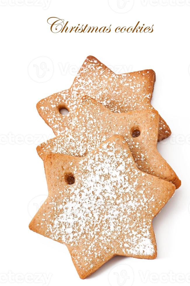 galletas navideñas caseras espolvoreadas con azúcar en polvo foto