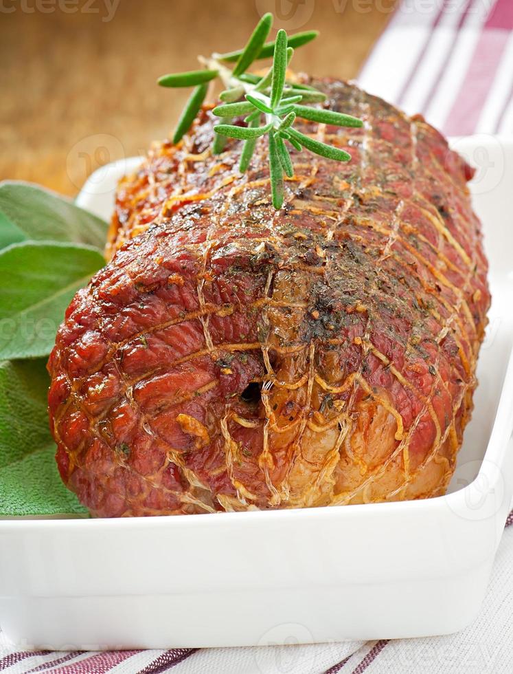 veal roll filled with minced beef meat and herbs photo