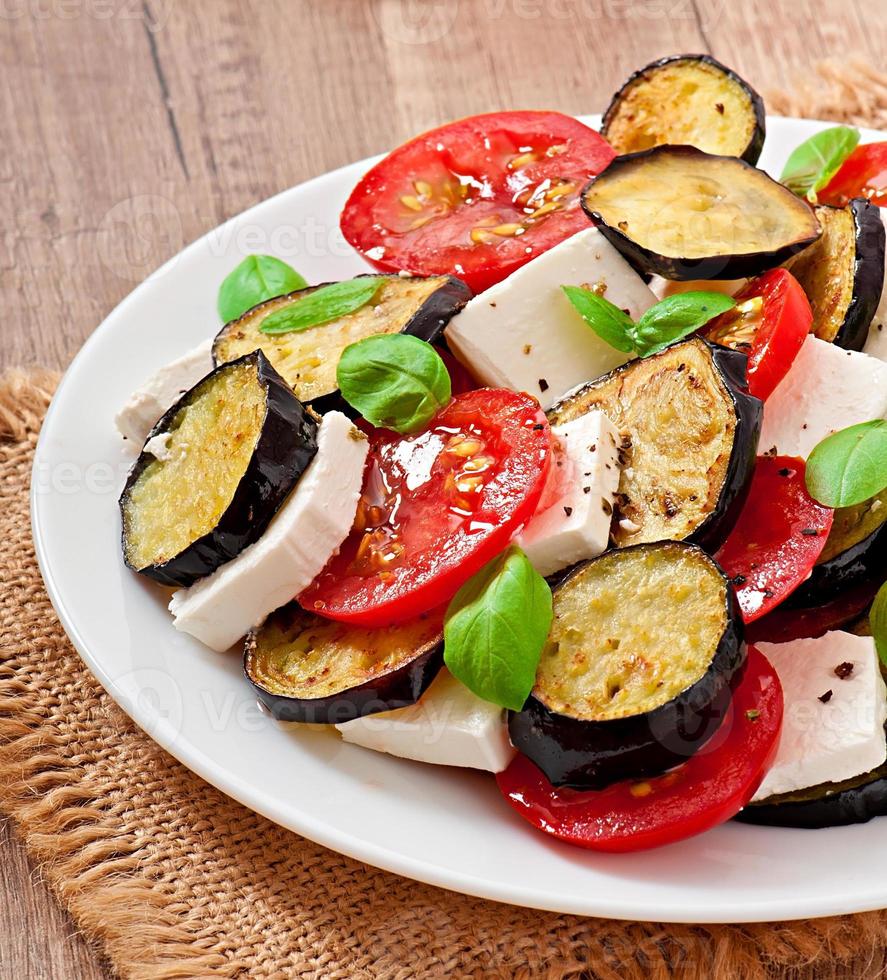 eggplant salad with tomato and feta cheese photo