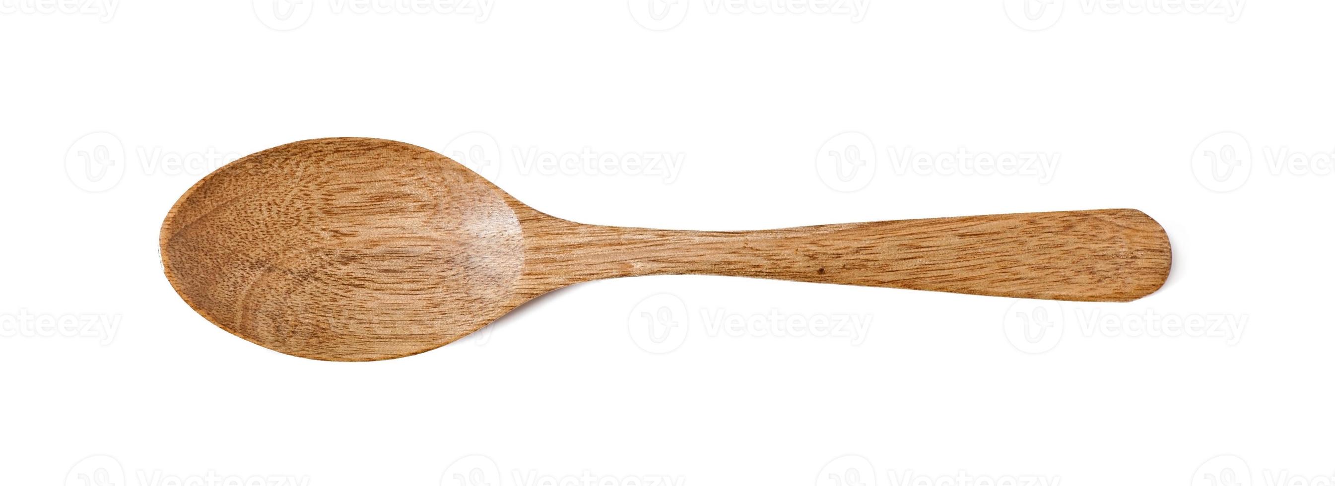 wooden spoon isolated on a white background photo