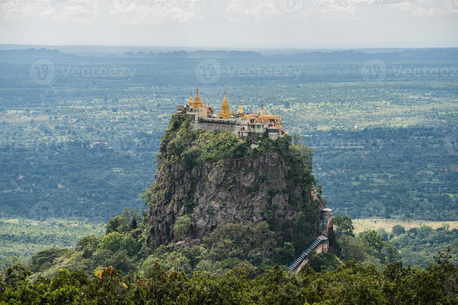 Mt.Popa home of the NAT, heavenly ghosts of the Burmese mythology. Mount Popa is an extinct volcano on the slopes of which can be found the sacred Popa Taungkalat monastery. photo