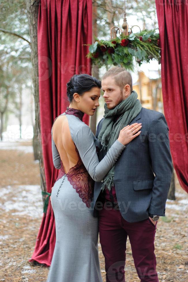 Wedding ceremony for two near the red arch photo