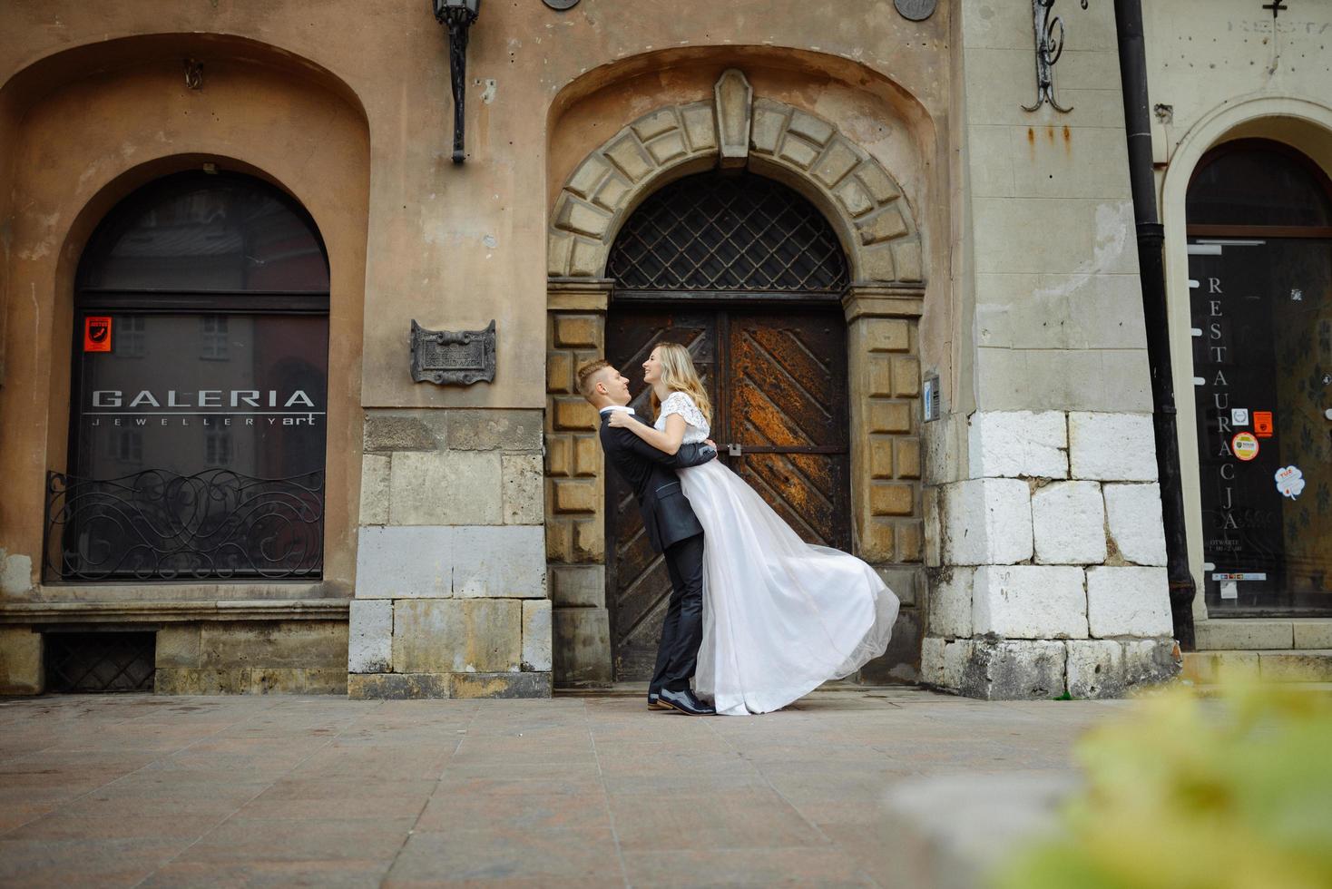 Two lovers walk along Krakow photo