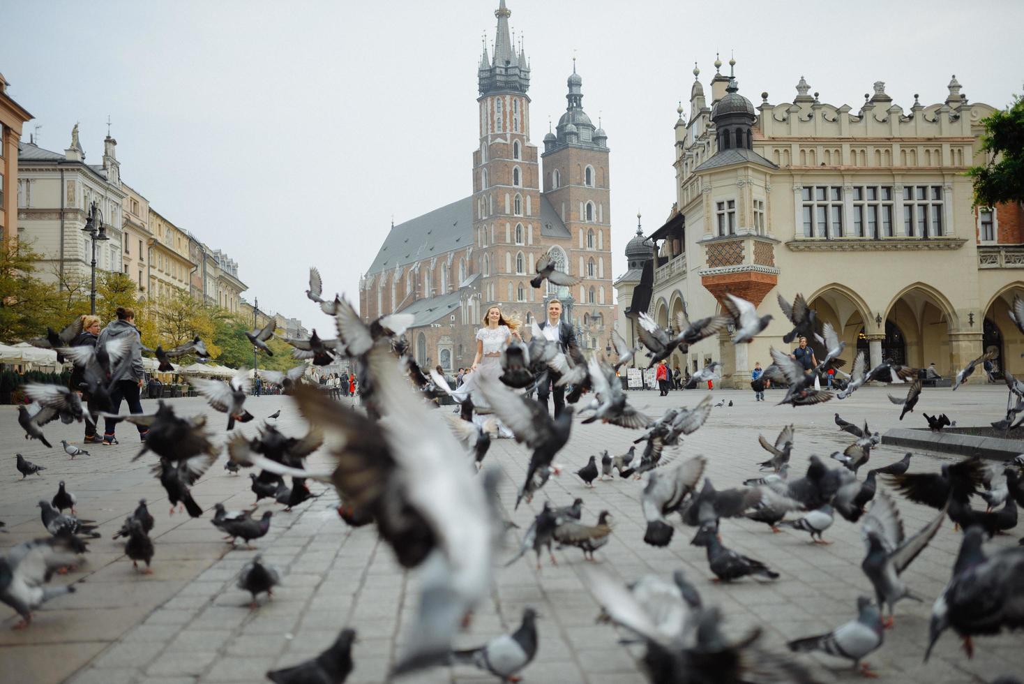 Two lovers walk along Krakow photo