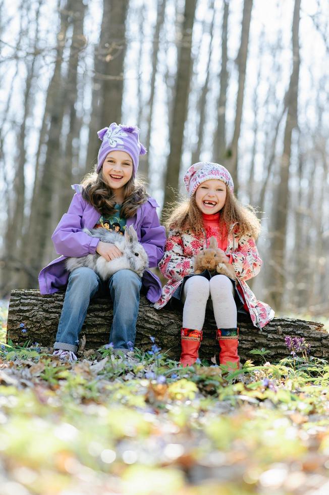 Little girls in the forest photo