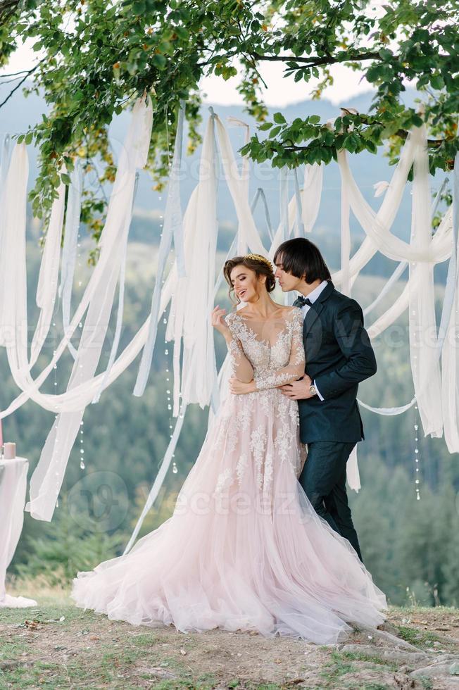 wedding photography in the Carpathians. Wedding ceremony in the forest photo